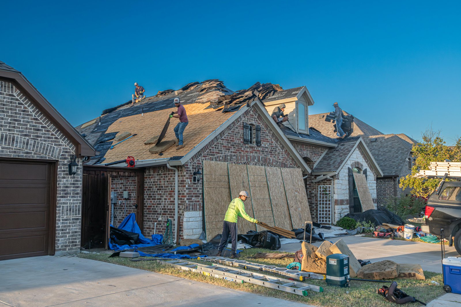 Complete roof tear-off after wind damage in Wichita KS